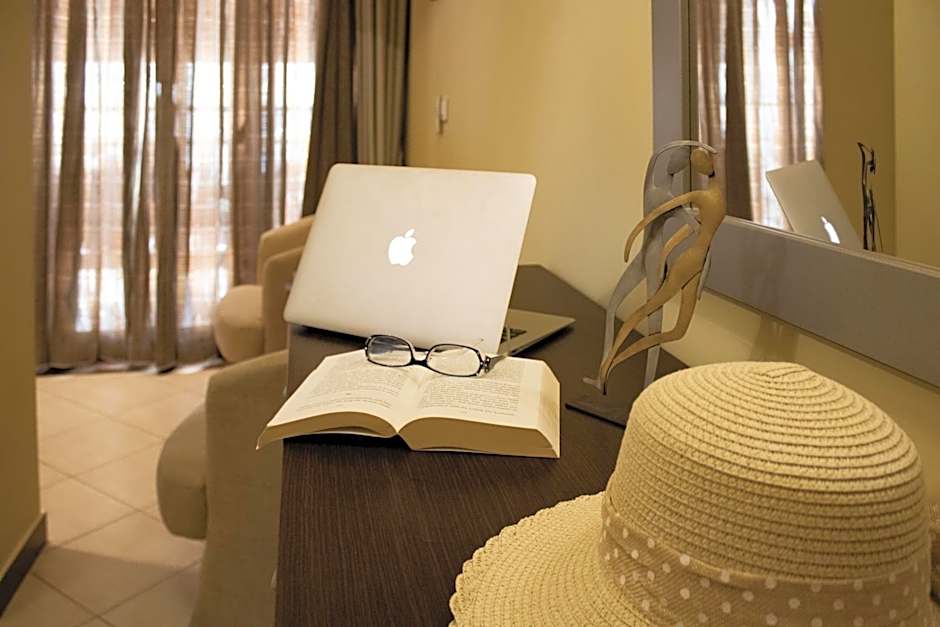 Meliton Inn Hotel & Suites by the beach