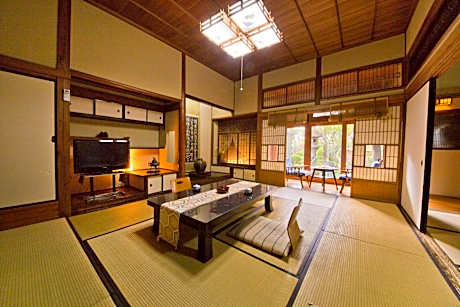 Family Room with Garden View and Shared Bathroom with Private Toilet
