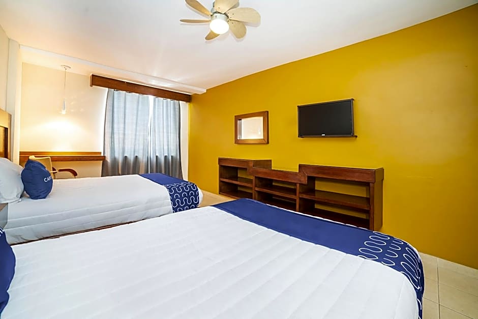 Capital O Hotel Casa Blanca