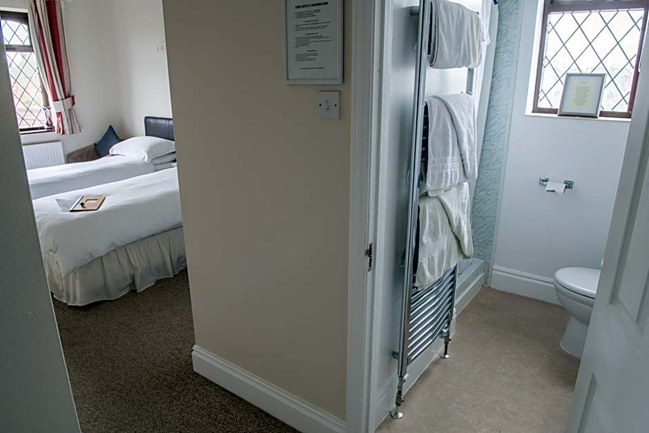 Toothbrush Rooms at Lattice Lodge - Guest Kitchen & EV Recharging