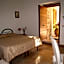 Rugiada Rooms