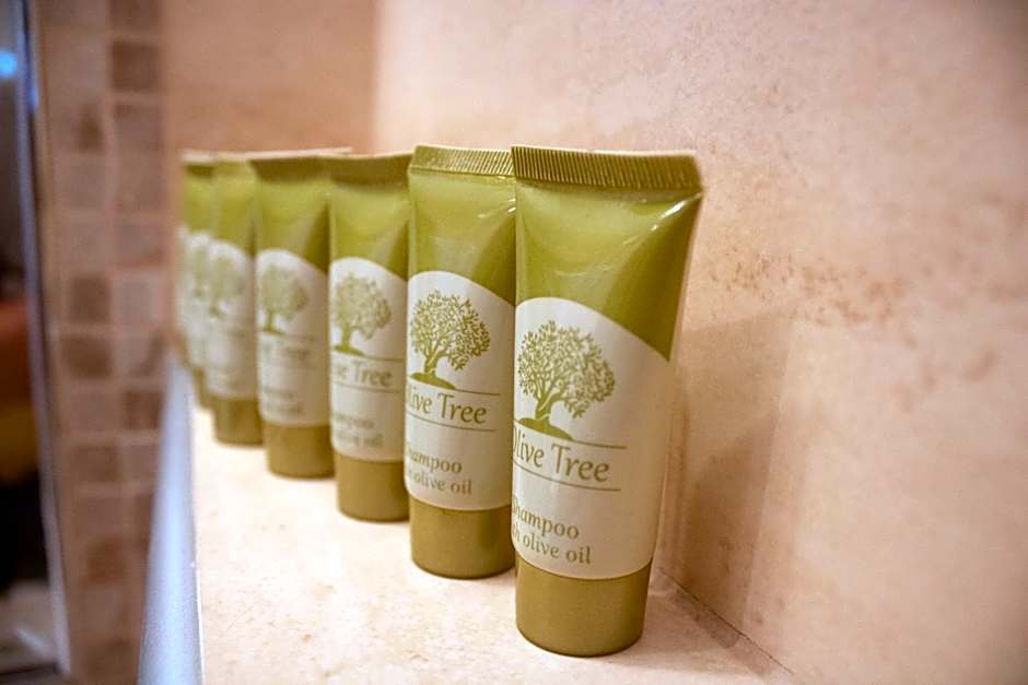 Meliton Inn Hotel & Suites by the beach