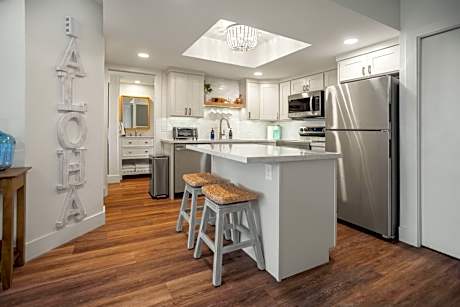 Beach Escape Walk to Beach, Shops and Dining with Pool and Hot Tub