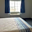 Days Inn & Suites by Wyndham Williamsburg IA North