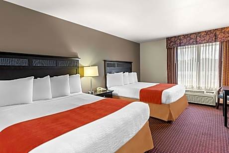 2 Queen Beds, Non-Smoking, Wireless High-Speed Internet, Microwave And Refrigerator, Table With Chai