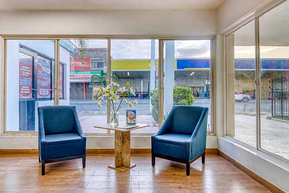 Capital O Hotel La Siesta