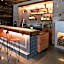 Texican Court, by Valencia Hotel Group