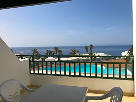 One-Bedroom Apartment with Pool View