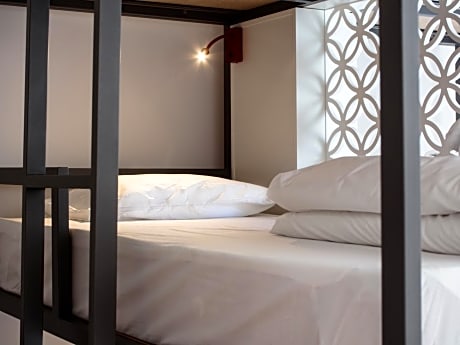 Bed in 9-Bed Female Dormitory Room