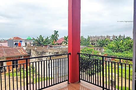 RedDoorz Syariah near Universitas Jambi Telanaipura