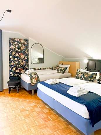 Triple Room with One Double Bed and One Single Bed