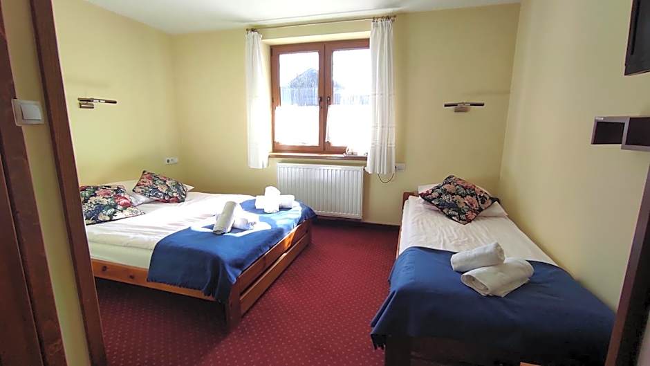 Photo 1 sur 7 de Triple Room