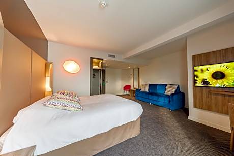 Quadruple Room with One Double Bed and One Sofa Bed