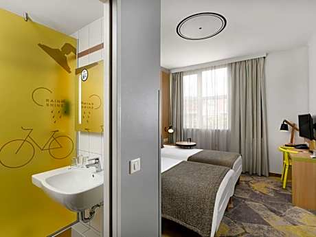 family room with one double and one single bed