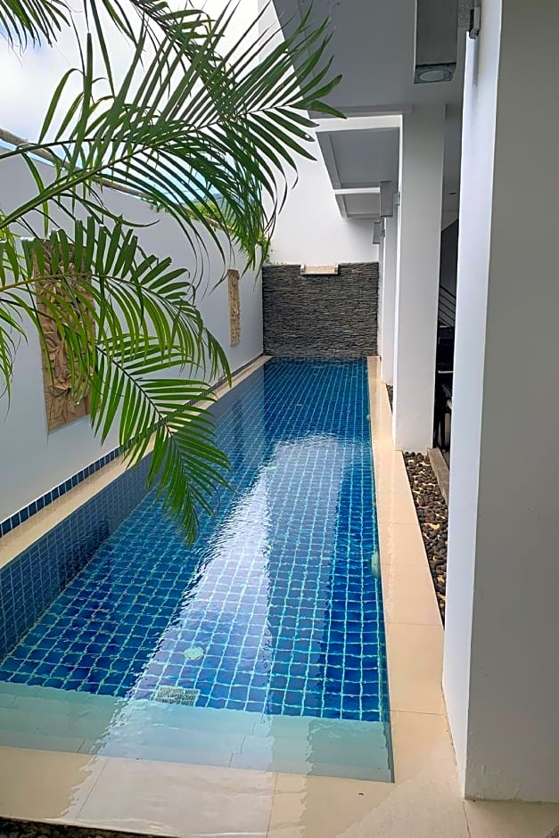 One World One Home Naiharn Hotel