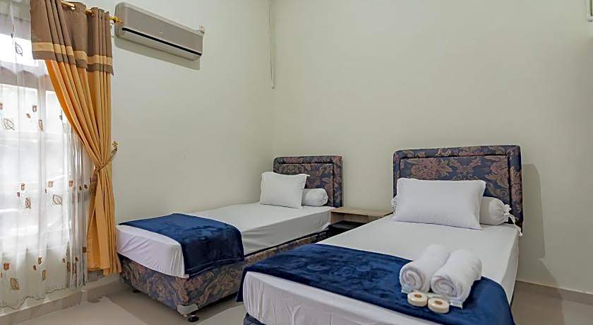 The Lima Guest House Syariah Mitra RedDoorz