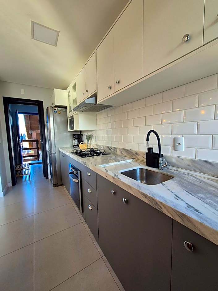 Casa no segundo andar na Praia da Cal com ar e sacada