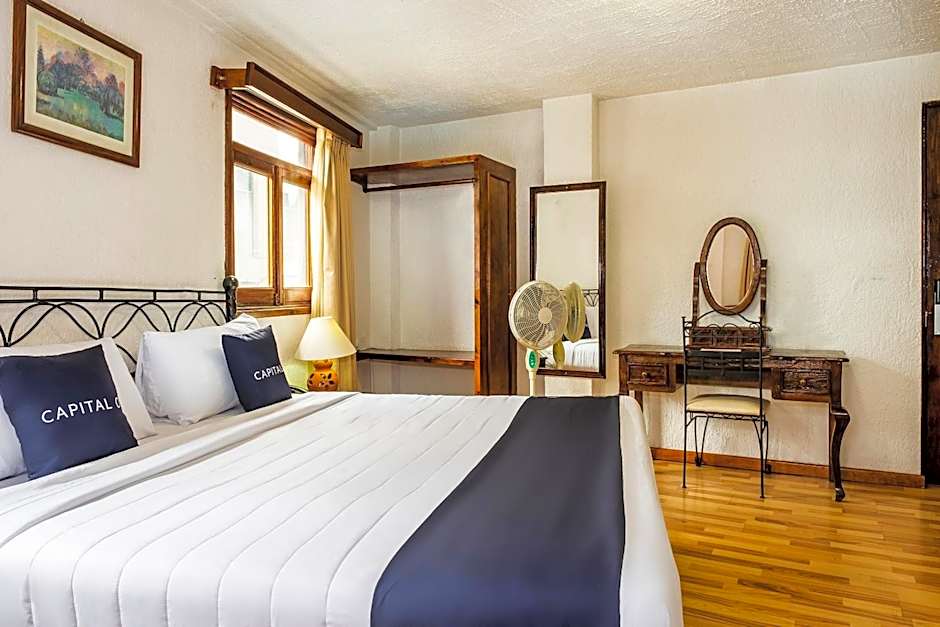 Capital O Hotel Central