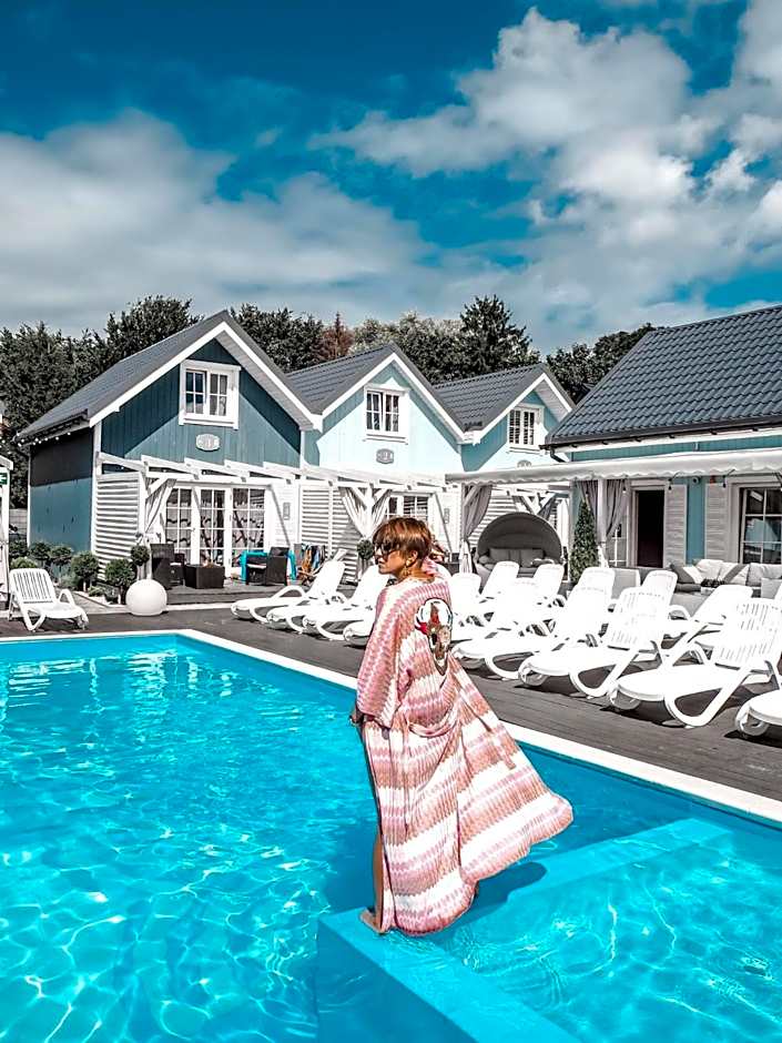 Domki BALTIC FAMILY basen kidsclub rowery