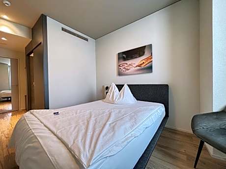 Standard Single Room with Little Natural Light and A/C