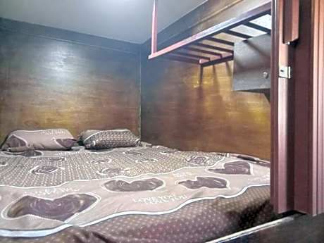 Single Bed in Dormitory Room