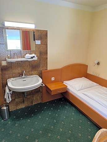 Economy Single Room with Shower and External Toilet