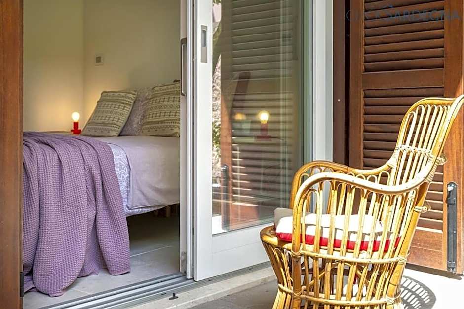 ClickSardinia Alghero Spectacular waterfront Neptune apartment with sea-facing terraces and garden