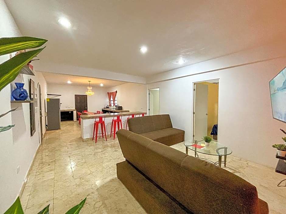 "Spacious Suite with 4 Bedrooms and Amenities"