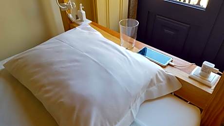 Bed in 8-Bed Female Dormitory Room