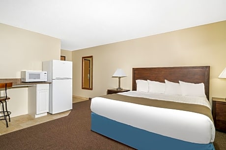 One-Bedroom Suite with One King Bed and Two Single Beds