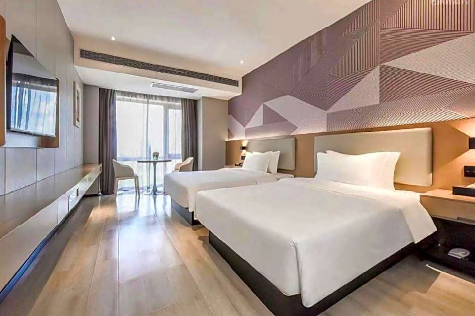 Boman Hotel Maoming High-speed ​​Railway Station South Aiqinghai Shopping Park