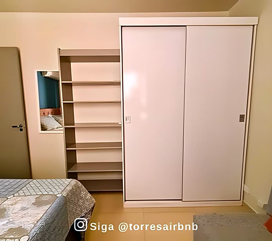 Apto 02 quartos | Ar condicionado | 500mts do mar