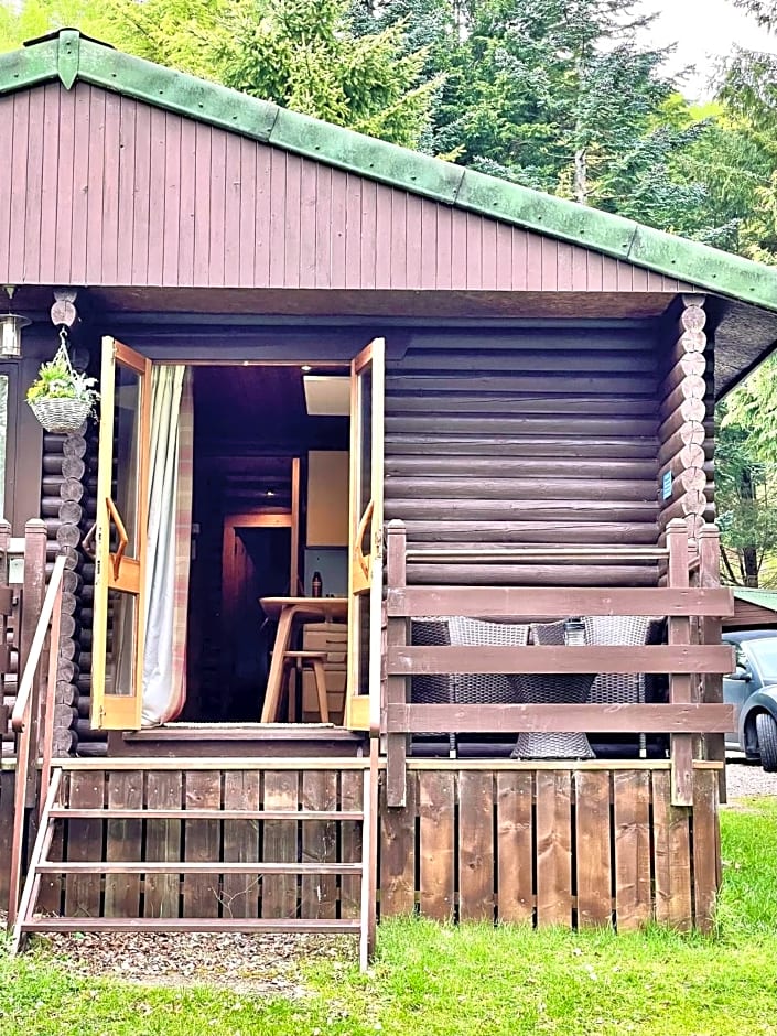 Riverside log cabins