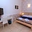 Aurelio Deluxe Rooms
