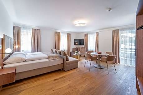 Family room with electric fireplace and balcony