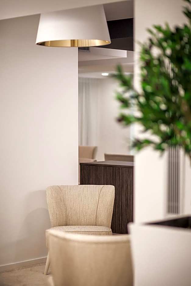 Essence Inn Marianos Hotel