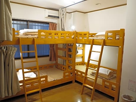 Room with 4 Bunk Beds and Shared Bathroom