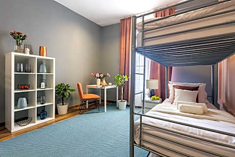 Single Bed in Dormitory Room