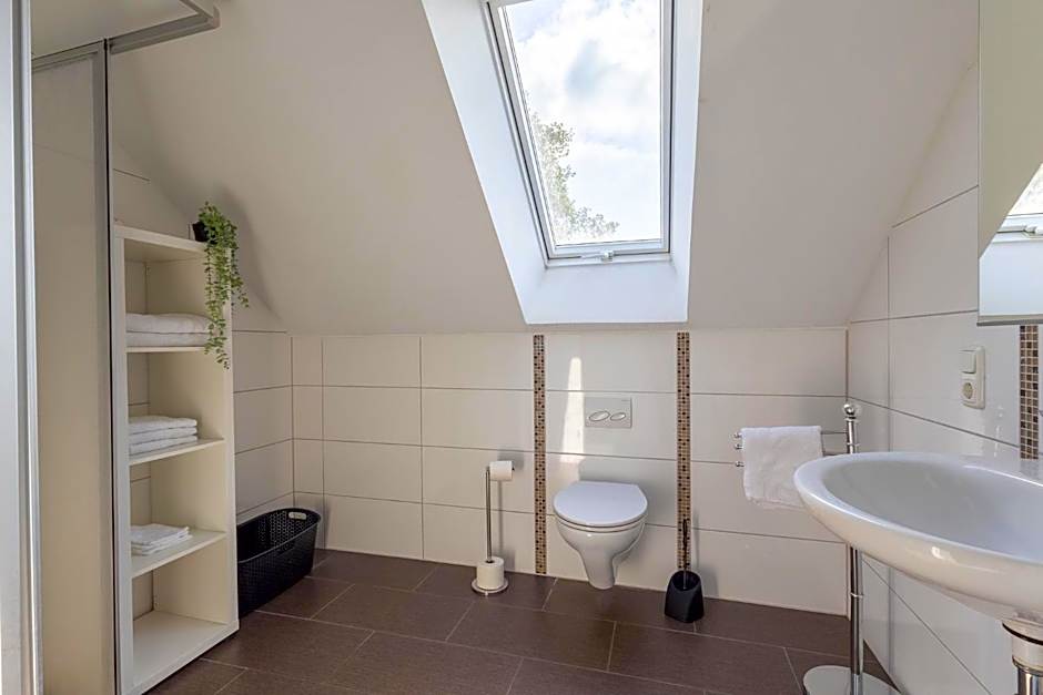 Natura Ferienhaus, Ferienwohnungen in Rhauderfehn , Komfort für Gäste & Firmen ,WLAN & Parkplatz