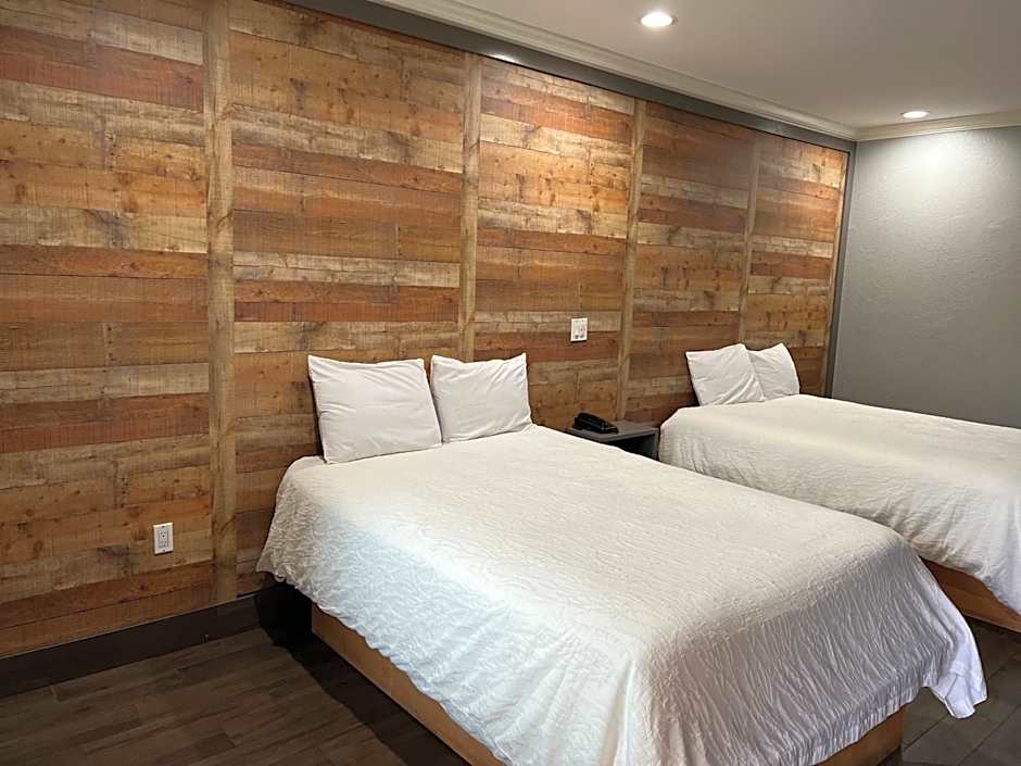 The Symphony Inn & Suites