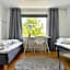 Comfortable guest rooms with fully equipped kitchen and cosy living room.