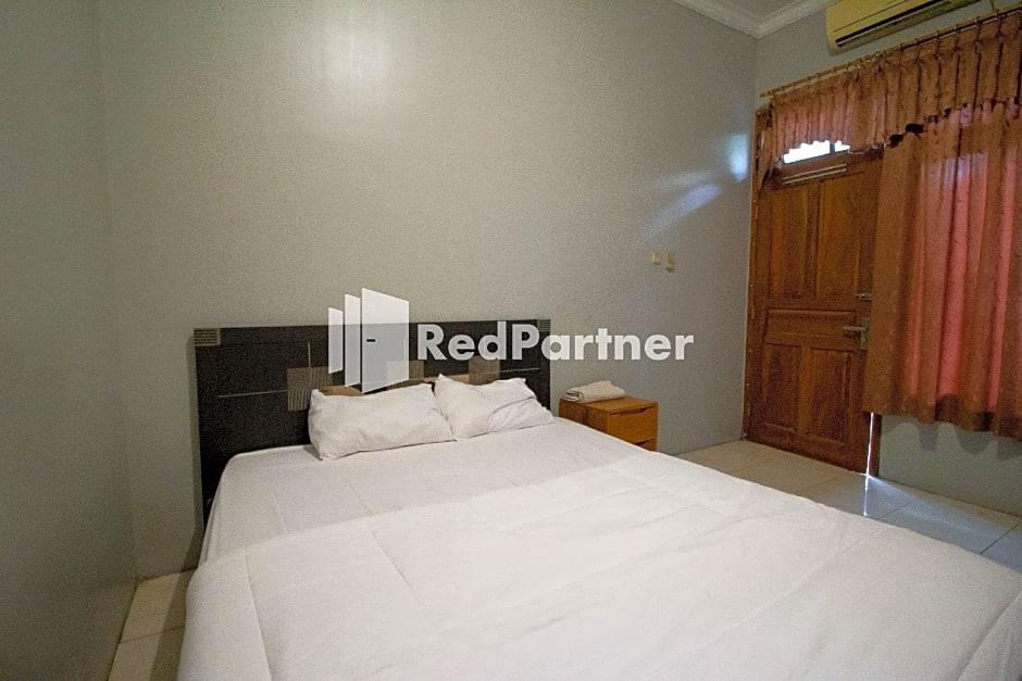 De Kost Solo Mitra RedDoorz