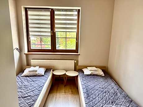 Bed in 3-Bed Dormitory Room with Shared Bathroom
