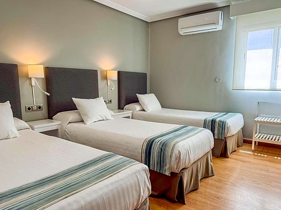 Photo 1 of 6 of Triple Room