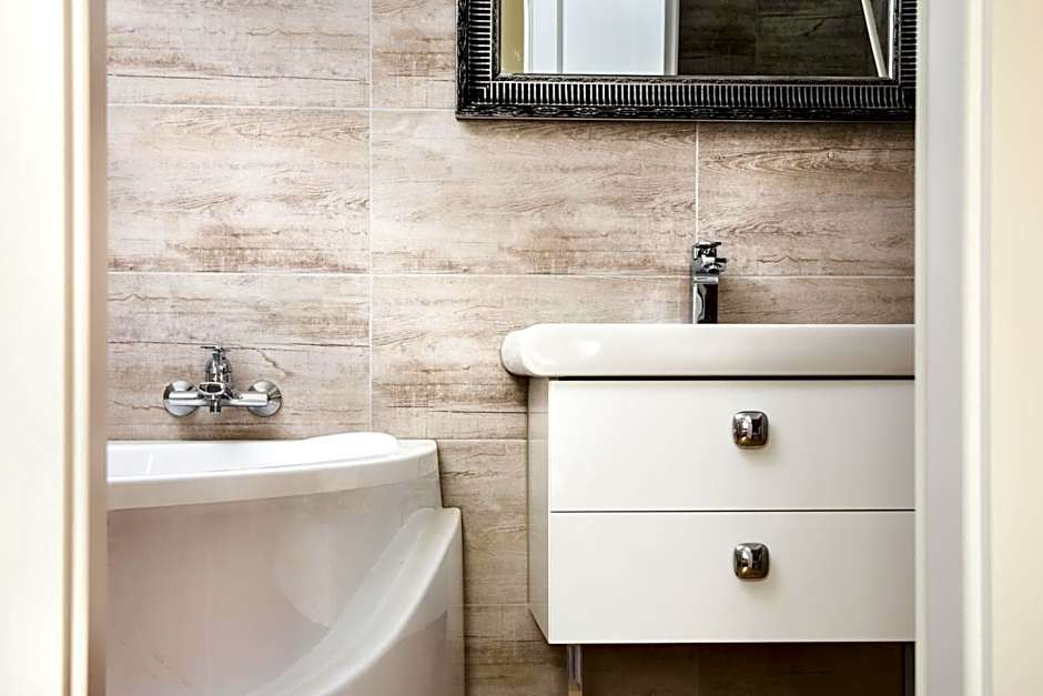 VILLA CENTRUM APARTMÁNY s RAŇAJKAMI A SAUNOU