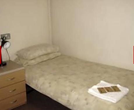 Basic Single Room with Shared Bathroom