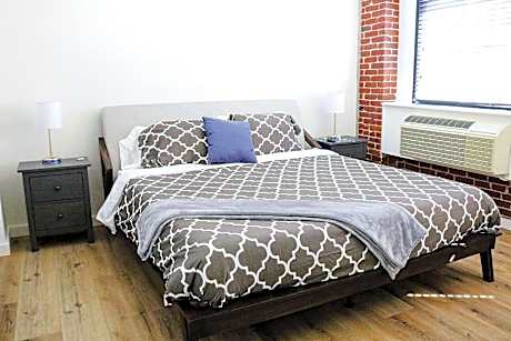 1 King Bed 1 Queen Bed 1-Bedroom Suite Non-Smoking