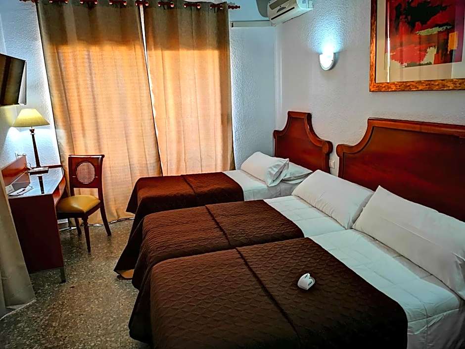 Photo 1 of 5 of Triple Room