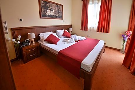 Two-Bedroom Suite with Balcony and Sea View