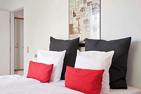 Family Room with One King and Two Single Beds - Non-Smoking